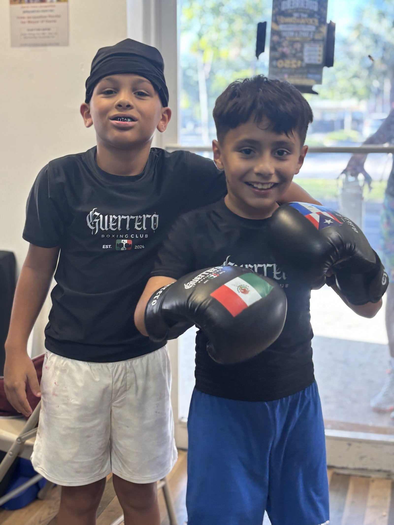 Two kids in Guerrero Boxing Club gear